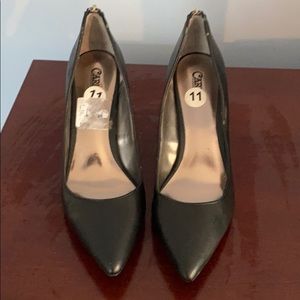 Never worn black pumps with zipper back